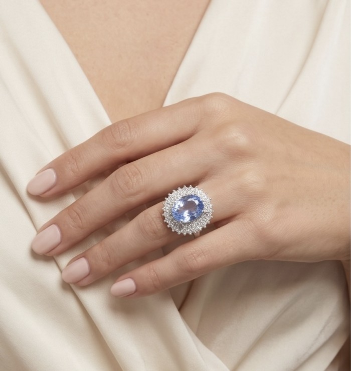 Precious Design oval cut 7.9 CARAT Tanzanite .925 Sterling Silver Statement Ring s. 8 - Tanzanite ring on hand showcasing oval cut gemstone with halo setting.