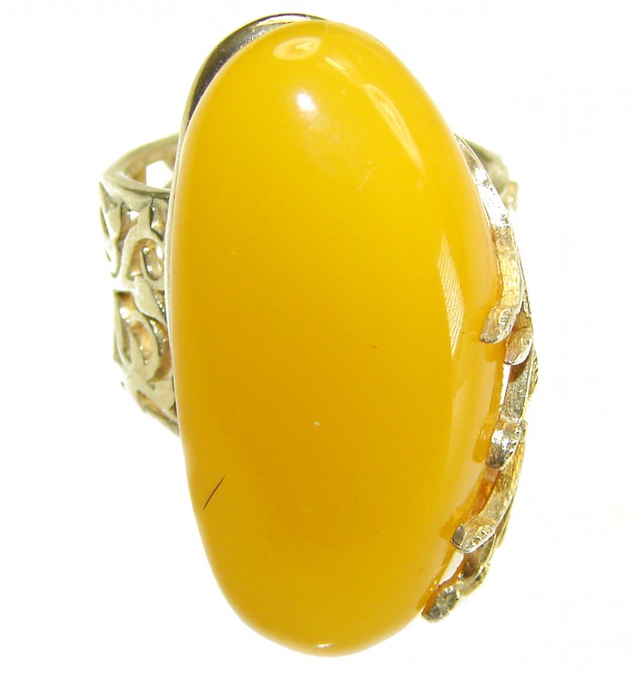 Authentic Golden Butterscotch Baltic Amber 18K Gold over .925 Sterling Silver entirely handcrafted ring; s. 7 adjustable - Side view of authentic butterscotch Baltic amber ring in 18K gold.