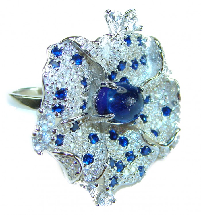 Exotic Flower - Authentic 7.5 carat Sapphire .925 Sterling Silver handcrafted Ring size 7 1/2 - Exotic flower ring with blue sapphires and diamonds, side view.