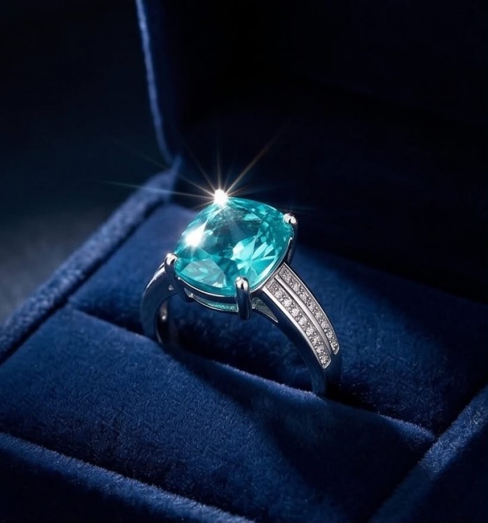 Eau Pure 8.2 carat Paraiba Tourmaline .925 Sterling Silver Handcrafted Ring size 8 adjustable - Paraiba Tourmaline ring close-up in blue velvet box.