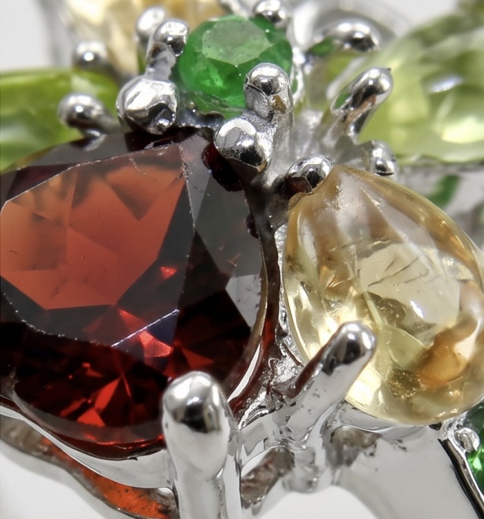 Red Heart 8.1 carat Multigem rhodium over .925 Sterling Silver Handcrafted Ring size 8 - Close-up of multigem ring with red heart stone in rhodium setting.
