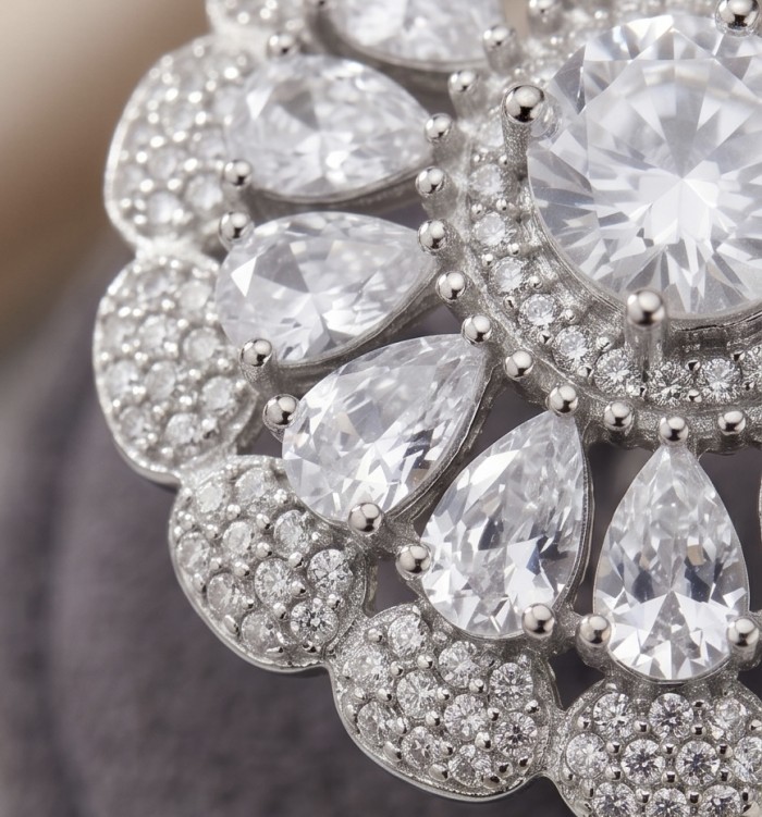 Giovanna - Precious 14.5 carta White Topaz rhodium over .925 Sterling Silver Statement ring size 7 1/2 - Close-up of white topaz and diamond accents on rhodium-plated jewelry.