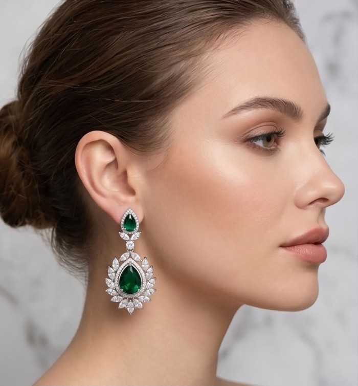 Magnificent Jewel 17.5 carat Emerald 14K white Gold over .925 Sterling Silver handcrafted earrings - Side view of woman wearing Magnificent Jewel emerald earrings