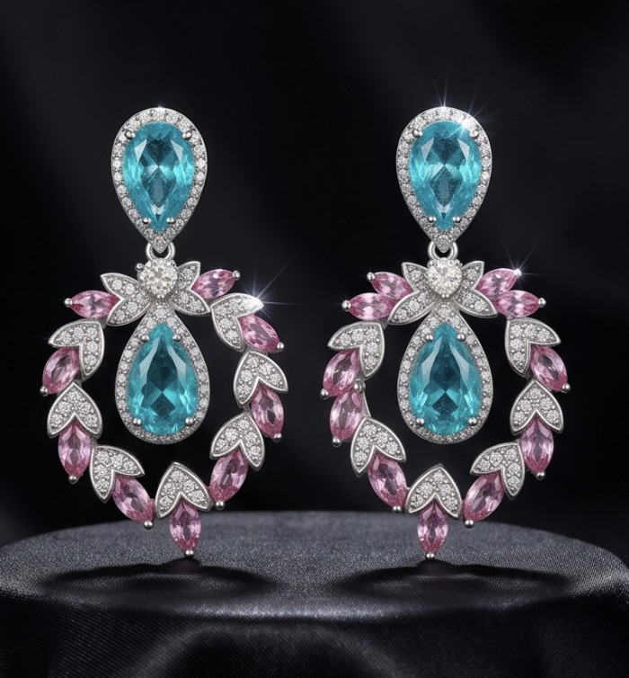 Bellissima Incredible 12.5 carat Paraiba Tourmaline .925 Sterling Silver entirely handmade earrings - Elegant earrings with Paraiba tourmaline, front view on black background.