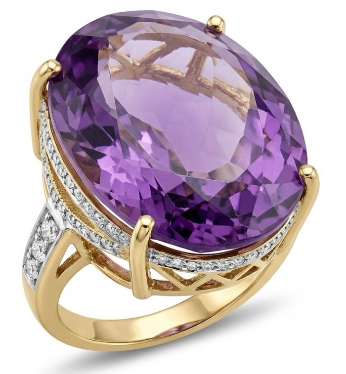 Empress of Uruguay 32.2 carat natural Amethyst .925 Sterling Silver dipped in 22K Gold Handcrafted Ring size 7 3/4 - Gold ring with large oval amethyst and diamond accents, side view.