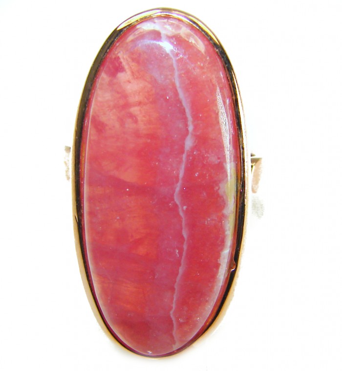 The best quality Argentinian Rhodochrosite 18K Rose Gold over .925 Sterling Silver handmade ring size 8 adjustable - Close-up of Argentinian Rhodochrosite in 18K Rose Gold setting.