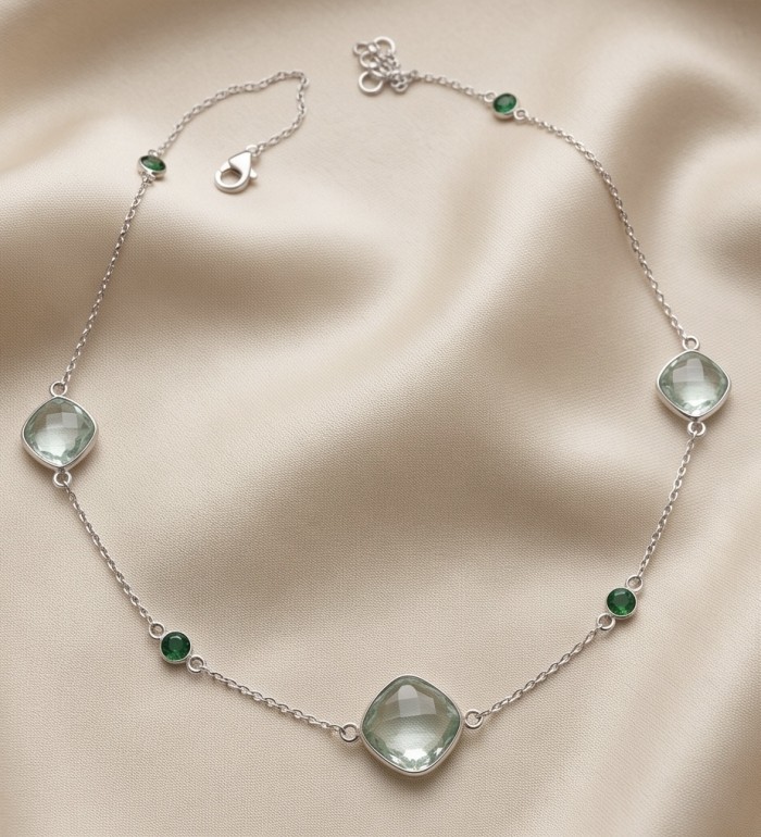 Infinity 18.5 carat Authentic Multigems Rhodium over .925 Sterling Silver handcrafted Statement necklace - Multigems rhodium necklace on fabric, showing full layout and clasp detail.