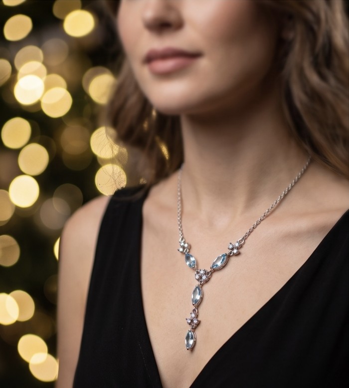 Infinity 9.5 carat Authentic Swiss Blue Topaz Rhodium over .925 Sterling Silver handcrafted Statement necklace - Elegant necklace with Swiss Blue Topaz, worn close-up view.