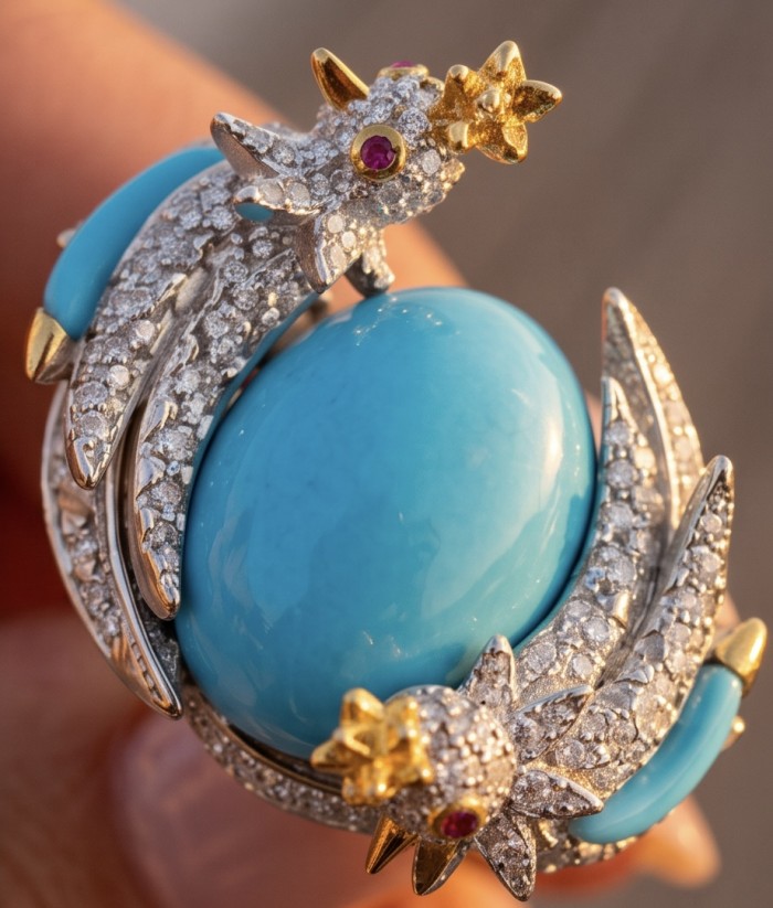 Birds on a Rock 0.7 carat Lab Grown Diamond genuine Sleeping Beauty Turquoise Ring in .925 Sterling Silver partially plated with 22K Gold size 7 - Close-up of bird-shaped jewelry with turquoise stone and diamonds.
